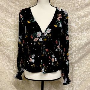 Floral blouse from Divided in a 10